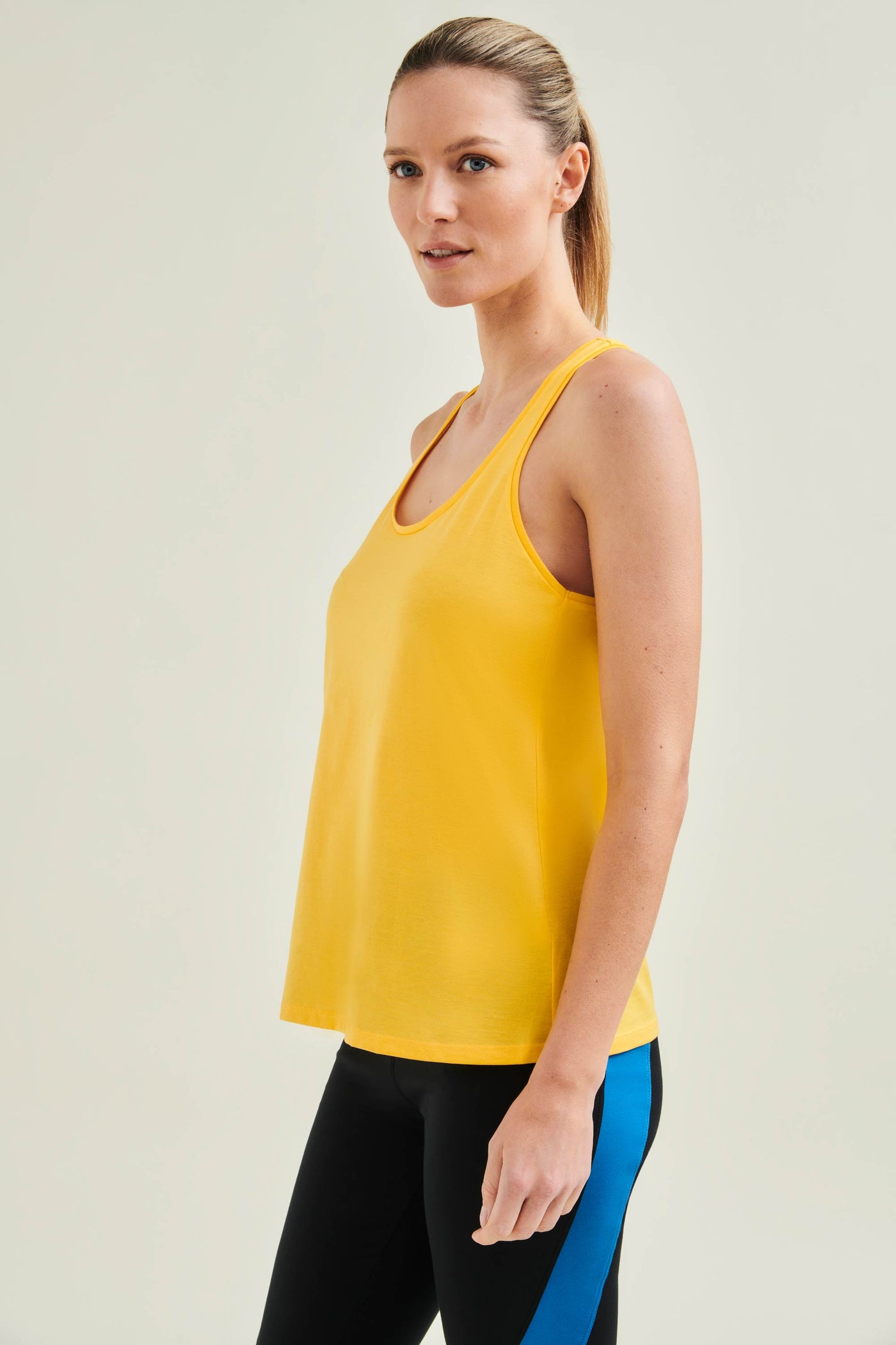 Plant-based Fibre Workout Top in Sunshine Yellow - Cradle to Cradle certified; combining sustainability with peformance